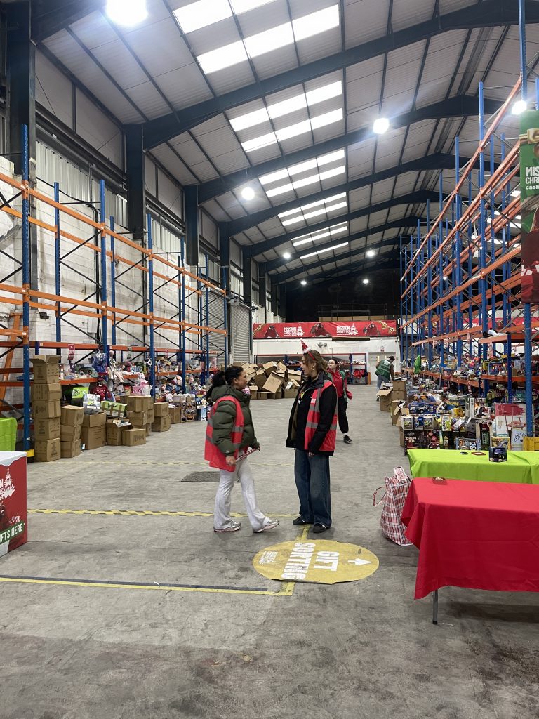 Cash for Kids Mission Christmas HQ Manchester with volunteers working