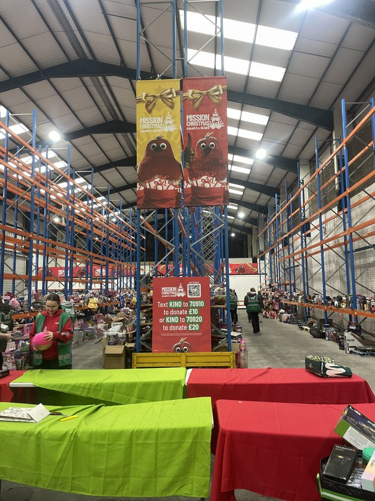 Cash for Kids Mission Christmas HQ with volunteers working