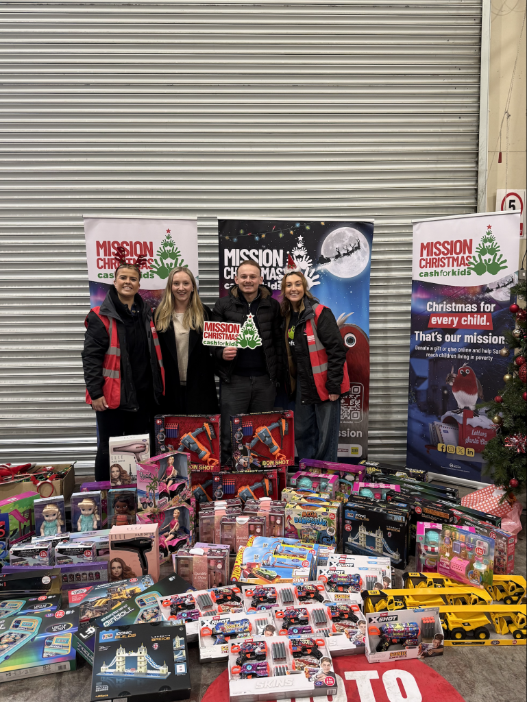Property Developer Show delivering gifts to Mission Christmas HQ